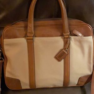 Coach briefcase .Worn once .Comes with long  strap